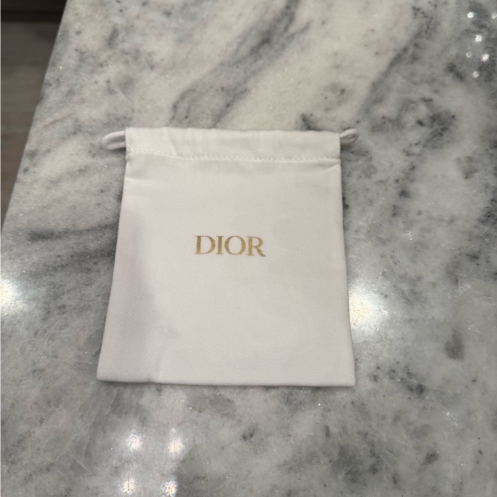 Dior Cream Drawstring Pouch